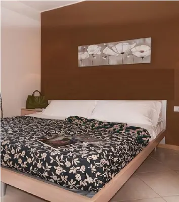 Letto o letti in una camera di residence 12,30