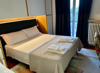 Letto o letti in una camera di 149 BORGO TICINO SUITE Attico di Lusso con Terrazzo e Parking Privato