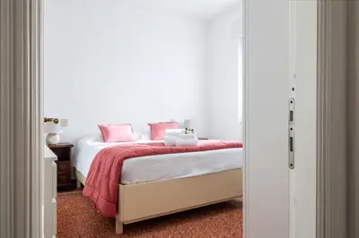 Letto o letti in una camera di CASA MARGHERITA