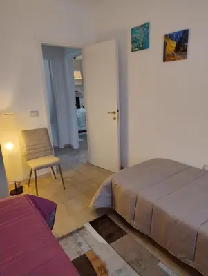 Letto o letti in una camera di Conchiglia Magica Albiano Magra - Lunigiana