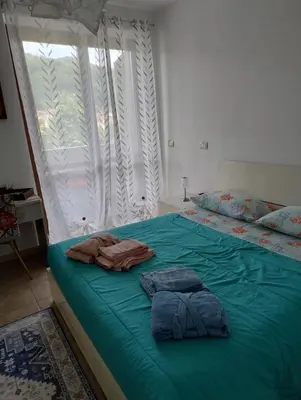 Letto o letti in una camera di Conchiglia Magica Albiano Magra - Lunigiana