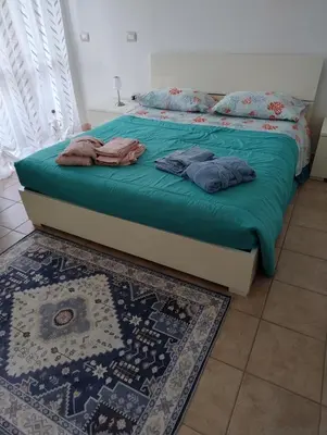 Letto o letti in una camera di Conchiglia Magica Albiano Magra - Lunigiana