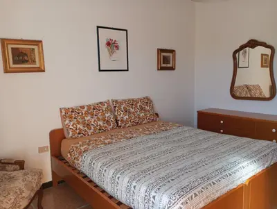 Letto o letti in una camera di Tigullio Vacations - Da Gabriella