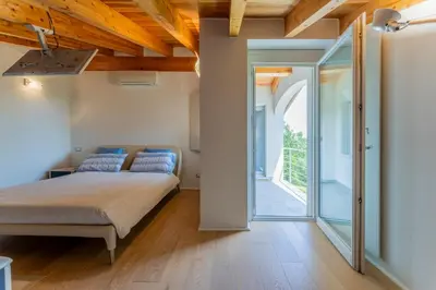 Letto o letti in una camera di Casa del Marchese, Pool, Wifi, Castell' Arquato