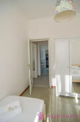 Letto o letti in una camera di FuoriPorta Affitti Brevi - Borgo San Giuseppe 16