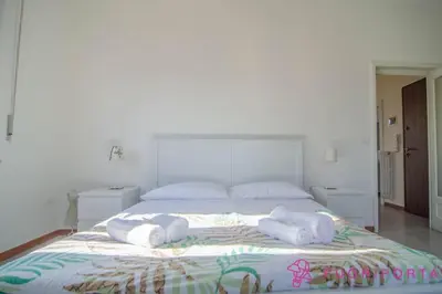Letto o letti in una camera di FuoriPorta Affitti Brevi - Borgo San Giuseppe 16