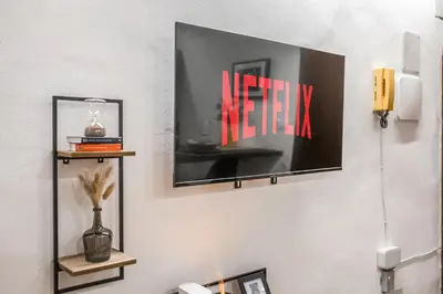 TV o dispositivi per l'intrattenimento presso Design in Centro a Modena, pass parcheggio incluso, Appartamento Ciao Bella