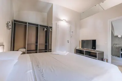 Letto o letti in una camera di Foresteria Il Voltone