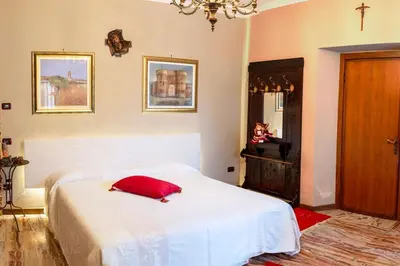 Letto o letti in una camera di Convivium