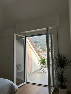 Letto o letti in una camera di La casa sul tetto