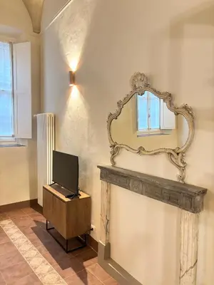 TV o dispositivi per l'intrattenimento presso Appartamento L'antica colonna, in centro storico