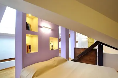 Letto o letti in una camera di SM Hospitality SANTO STEFANO