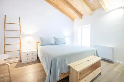 Letto o letti in una camera di B&B La Volpe