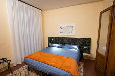 Letto o letti in una camera di Locanda del Centrale
