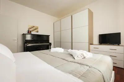 Letto o letti in una camera di Modena Visit Apartment