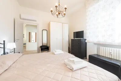 Letto o letti in una camera di GuestHost - Oltretorrente Ospedale Apartment