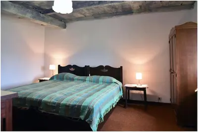 Letto o letti in una camera di Casale La Fabbrica