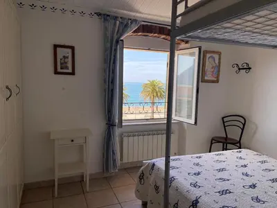 Letto o letti in una camera di A window to the sea