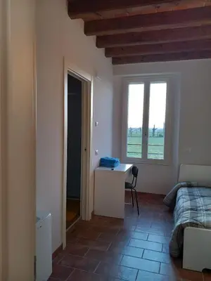 Letto o letti in una camera di L'Antico Fienile Agriturismo