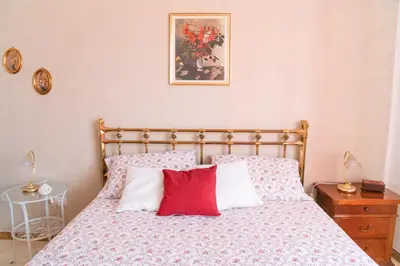 Letto o letti in una camera di Casa di Paola
