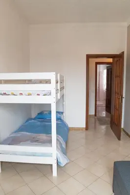 Letto o letti in una camera di Casa di Paola
