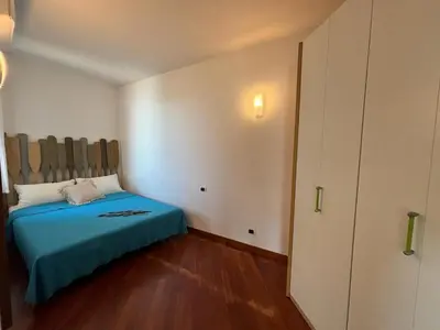 Letto o letti in una camera di Villa Marta