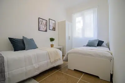 Letto o letti in una camera di 186 - Casa Aureliana VISTA MARE a Lavagna 100 metri dal Mare e spiaggia - PARCHEGGIO GRATIS INCLUSO