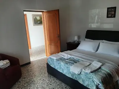 Letto o letti in una camera di Casa vacanza DH