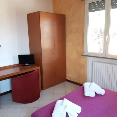 Letto o letti in una camera di Il Rampicante-Monticelli Terme