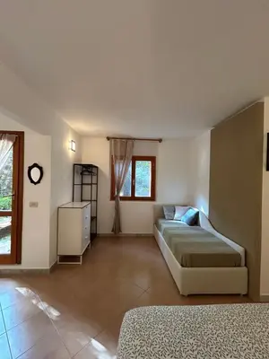Letto o letti in una camera di La Casetta