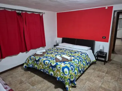 Letto o letti in una camera di Love nest Parma