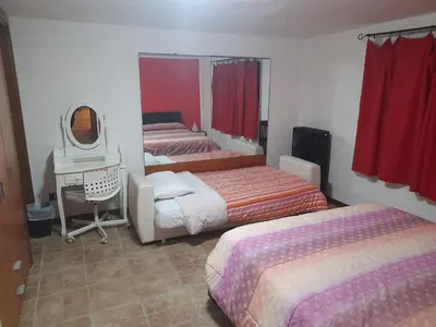 Letto o letti in una camera di Love nest Parma