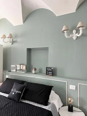 Letto o letti in una camera di COTTON CANDY TORTELLINOSUITE Modena