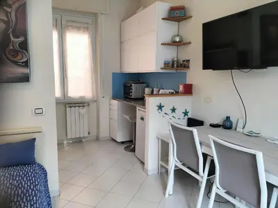 Cucina o angolo cottura di Nives Cosy Apt in the Center with terrace and AC