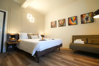 Letto o letti in una camera di Mazzini's Rooms