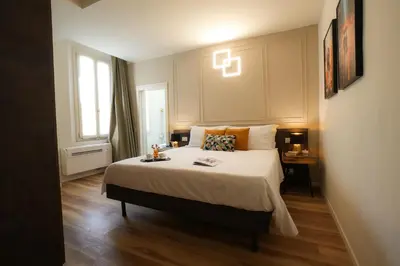 Letto o letti in una camera di Mazzini's Rooms