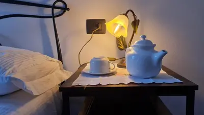 Letto o letti in una camera di Casa delle rondini