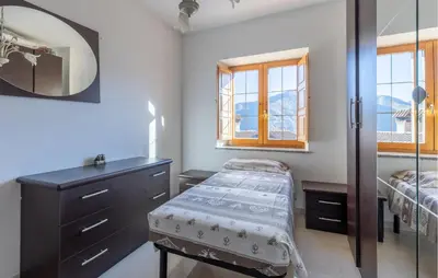 Letto o letti in una camera di Cozy Home In Comano With Wifi