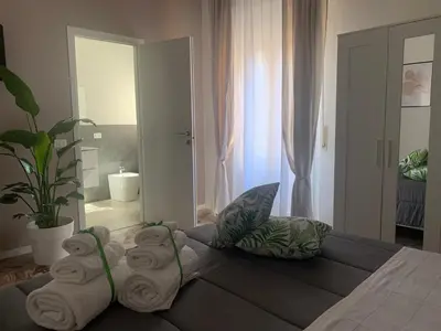 Letto o letti in una camera di b&b Calvino