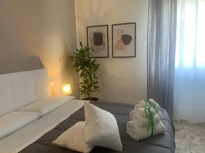 Letto o letti in una camera di b&b Calvino
