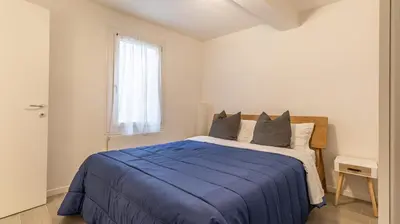 Letto o letti in una camera di Suite Rua Pioppa - Affitti Brevi Italia
