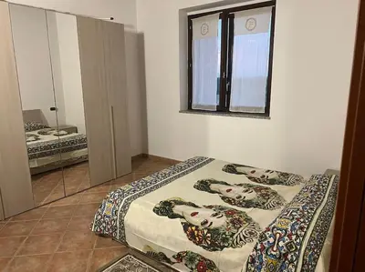 Letto o letti in una camera di ERIK 31Appartamento confortevole