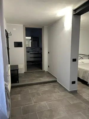 Letto o letti in una camera di B&B Il Gelsomino