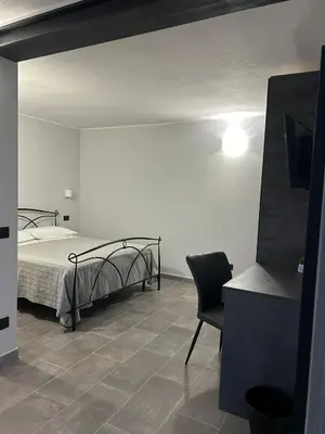 Letto o letti in una camera di B&B Il Gelsomino