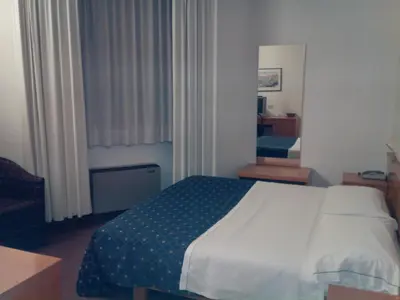 Letto o letti in una camera di Hotel Niki
