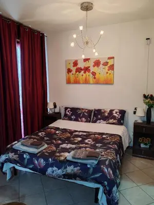 Letto o letti in una camera di Casa Angela Parma