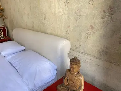 Letto o letti in una camera di 7.Frecavalli Appartamento in Palazzo d'epoca