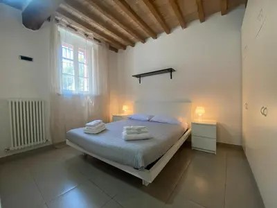 Letto o letti in una camera di Casa Fabrizio - Nice Suite con parcheggio su richiesta