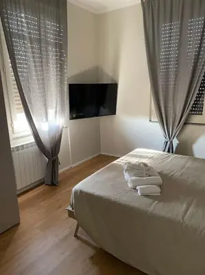 Letto o letti in una camera di Cucchiari Suite 7C
