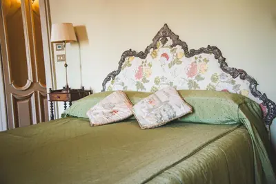 Letto o letti in una camera di Castello Di Mornico Losana